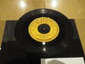 Elvis Presley sings the Milkcow Blues Boogie on Sun Records